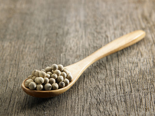 Black and white  peppercorns