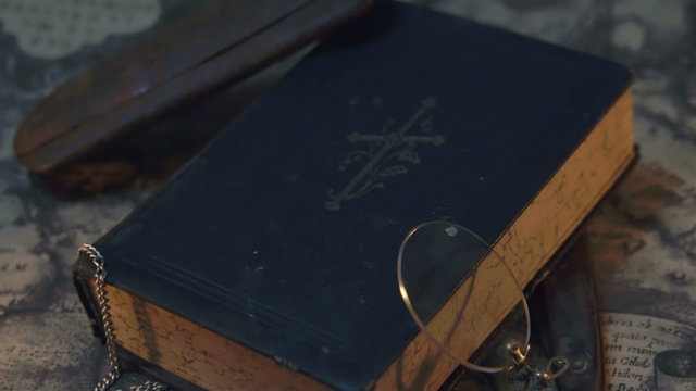 The bible eyeglass and the razor