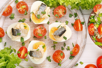 Fototapeta na wymiar Easter eggs with mayonnaise and herring