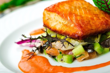 Salmon. Grilled Salmon Steak  with Spinach, Tartare Cream and