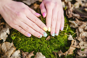 manicure on a background of moss