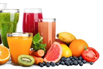 Fruit. Glasses of fruit and vegetable juice with fruits on a