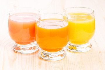 Three glasses of fresh natural juice.