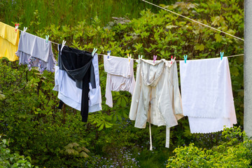 Clean laundry hanging to dry on line outdoor