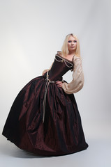 Naklejka premium Girl in medieval beautiful dress