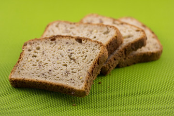 Bread Slices on Green Background