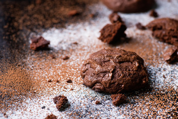 Homemade chocolate cookies on dark background