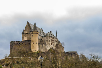 Fototapeta na wymiar Vianden castle in cloudy winter day, Luxembourg