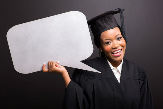 young afro american graduate with blank text bubble