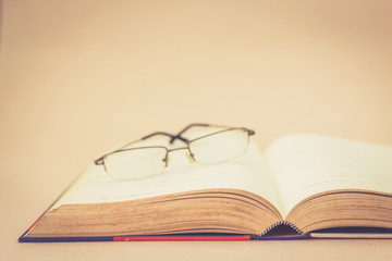 Book and glasses