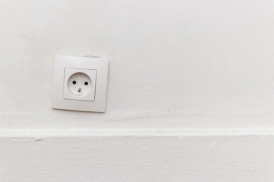 outlet on the white wall