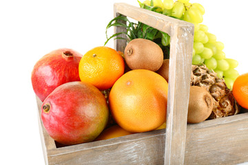 Assortment of fruits in box isolated on white