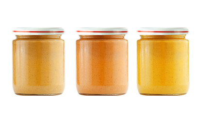 Jars of baby puree isolated on white