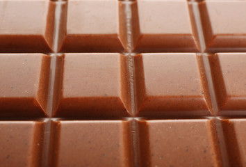 Milk chocolate bar close up