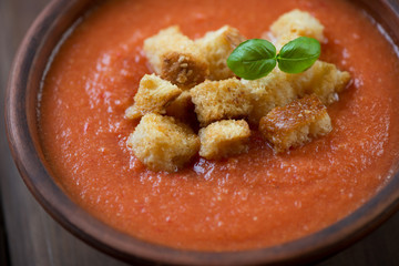 Close-up of gazpacho with croutons, selective focus