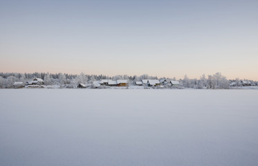 Fototapeta premium Winter landscape in russian village