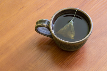 Сlay Cup of tea with teabag.