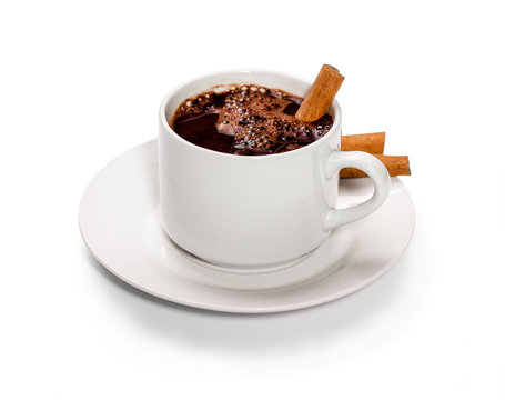 isolated white cup of hot chocolate with cinnamon.