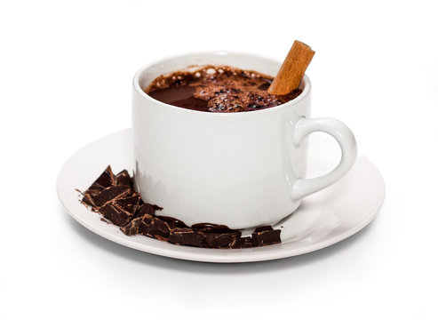 isolated white cup of hot chocolate with cinnamon.