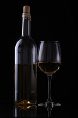 Wine bottle and glass