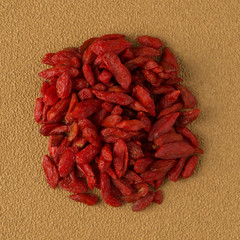 Circle of dry red goji berries