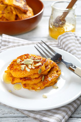 Sweet pumpkin pancakes on a plate