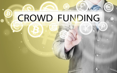 Businessman pushes virtual crowd funding button