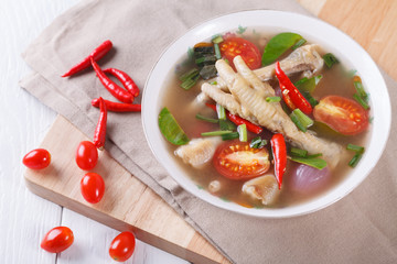 sour and spicy chicken feet soup