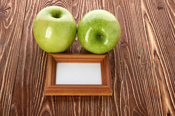 green apple on wooden background