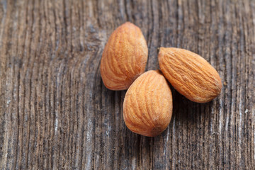 almonds on wood background