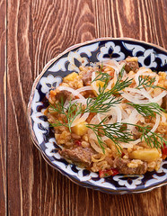 Oriental shah pilaf, pilaw, plov, rice with meat in pastry filo