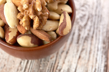 Mix nuts  on wooden  background