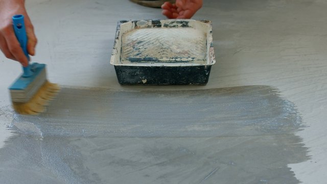 House painter primer concrete floor.