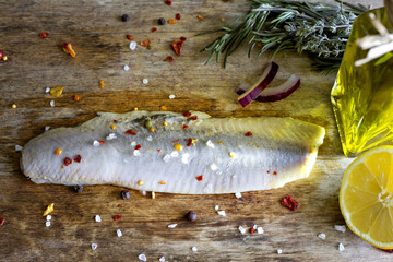 Herring fillet in oil vintage still life food background concept