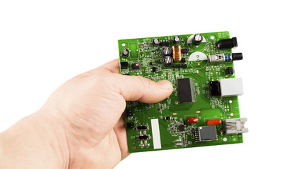 Electronic microcircuit in his hand