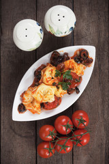 Tortellini pasta in olive and tomato sauce