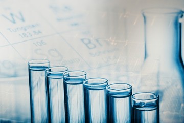 Technician. Laboratory research, dropping liquid to test tube