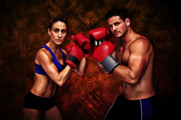 Plakat Composite image of boxing couple