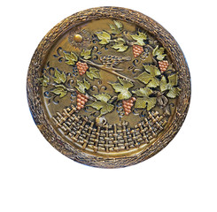 Decorative ornated metallic plate with grape and leafs pattern