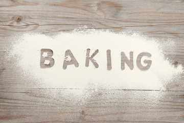 Word baking written in flour