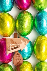 Composite image of easter egg hunt sign