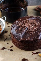 homemade chocolate torte cake on baking paper