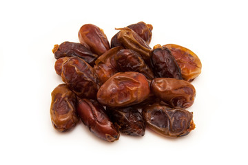 Medjool dates isolated on a white background.