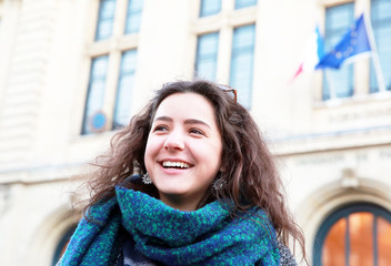 Beautiful student girl on background of Sorbonne