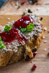 traditional liver pate on fresh bread with cranberry