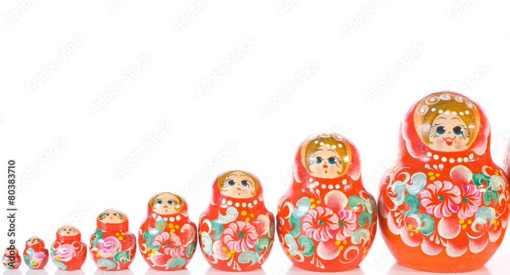 Wall mural Russian souvenir Matryoshka toy dolls white background