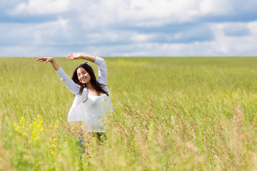 happy girl dancing outside