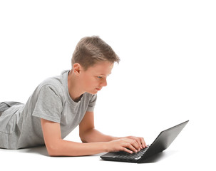 Teenager using notebook computer