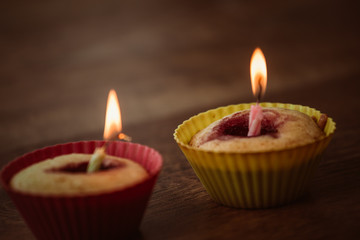 Birthday Banana muffin on wooden background