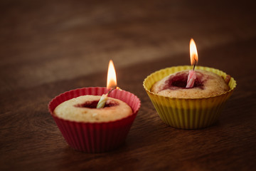 Birthday Banana muffin on wooden background